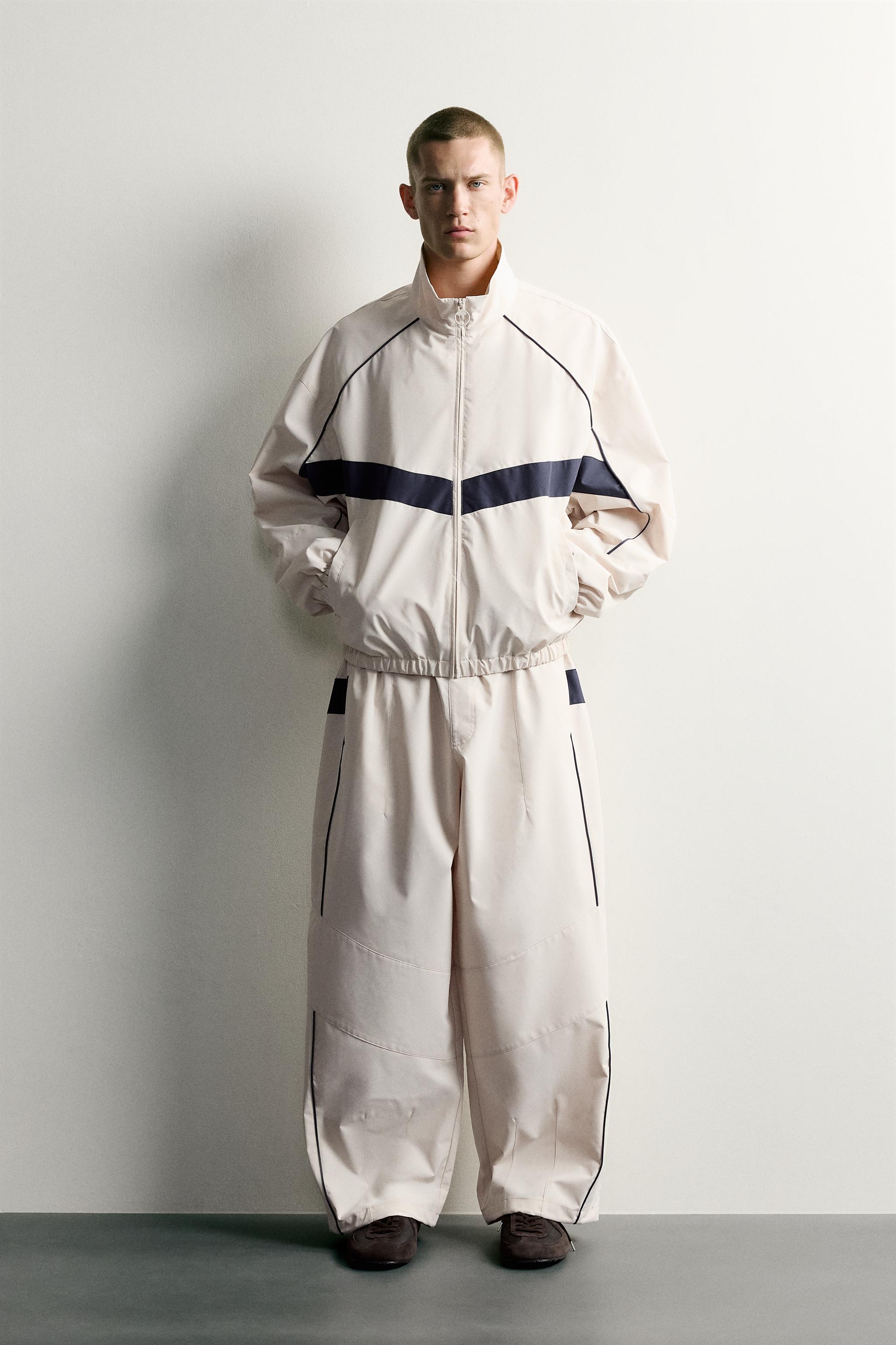 PANTALON TECHNIQUE À CONTRASTES DÉPERLANT
